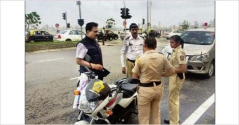 Traffic cops riding without helmets caught by Transport Minister Diwakar Raote