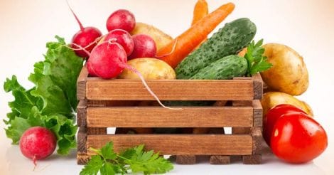 Fresh vegetables in wooden box