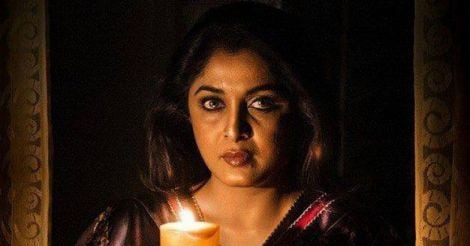 remya-with-candle remya-with-candle