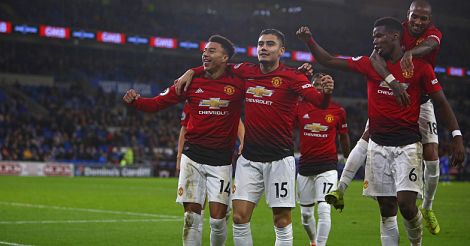 Jesse Lingard celebrates with teammates