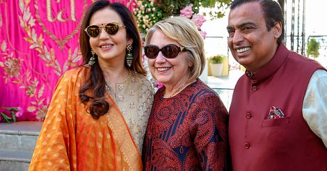 Mukesh Ambani and wife with Hillary Clinton