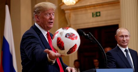 Trump throws football to Melania 