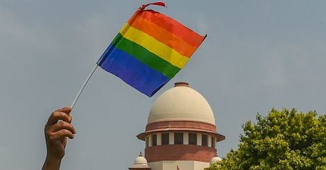 rainbow flag in front of Supreme Court