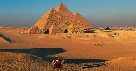 The Pyramids of Menkaure, Khafre and Khufu, Giza Necropolis, Egypt.