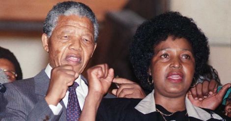 Anti-apartheid leader and African National Congress (ANC) member Nelson Mandela and wife Winnie raise fists upon Mandela release from Victor Verster prison, 11 February 1990 in Paarl