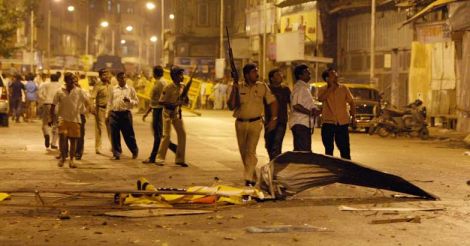 Indian policeman prepare to take position at the site of attack in Colaba area of Mumbai on November 27, 2008.