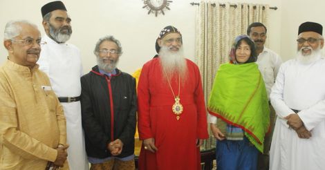 Prof. P.C. Alias with Catholicose and Irom Sharmila