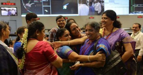 This photograph of Isro administration staff celebrating the Mars mission went viral