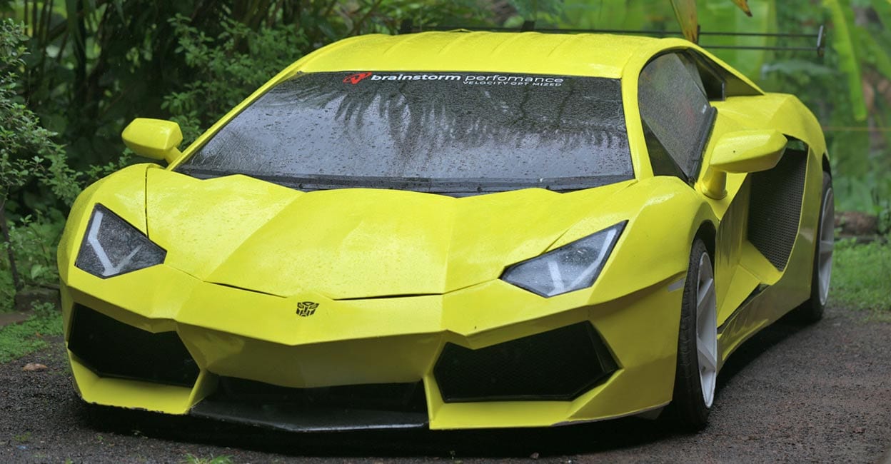 A 27-year-old built a striking yellow Lamborghini Aventador replica from a Tata Nano, utilising salvaged parts and self-taught fabrication skills,.Lamborghini replica build, Tata Nano supercar conversion, DIY supercar India, custom car fabrication Kerala, Sarin's Aventador build, budget supercar project, creative car modification, home-built supercar, automotive project Kerala, Nano to supercar, Keralan car enthusiast, viral car build, replica car construction, unique automotive creation, homemade exotic car