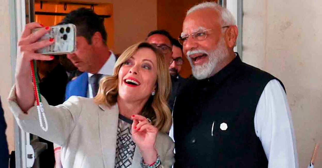 PTI06_15_2024_000037B Apulia: Prime Minister of Italy Giorgia Meloni takes a selfie with Prime Minister Narendra Modi on the sidelines of the G7 summit, in Apulia, Italy, Friday, June 14, 2024. (PTI Photo) (PTI06_15_2024_000037B)