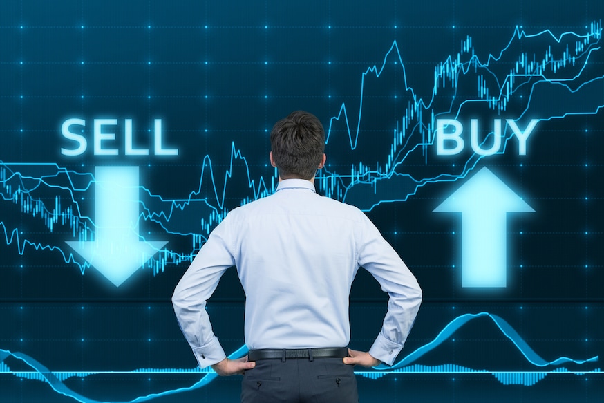 businessman looking to graph on virtual touchscreen