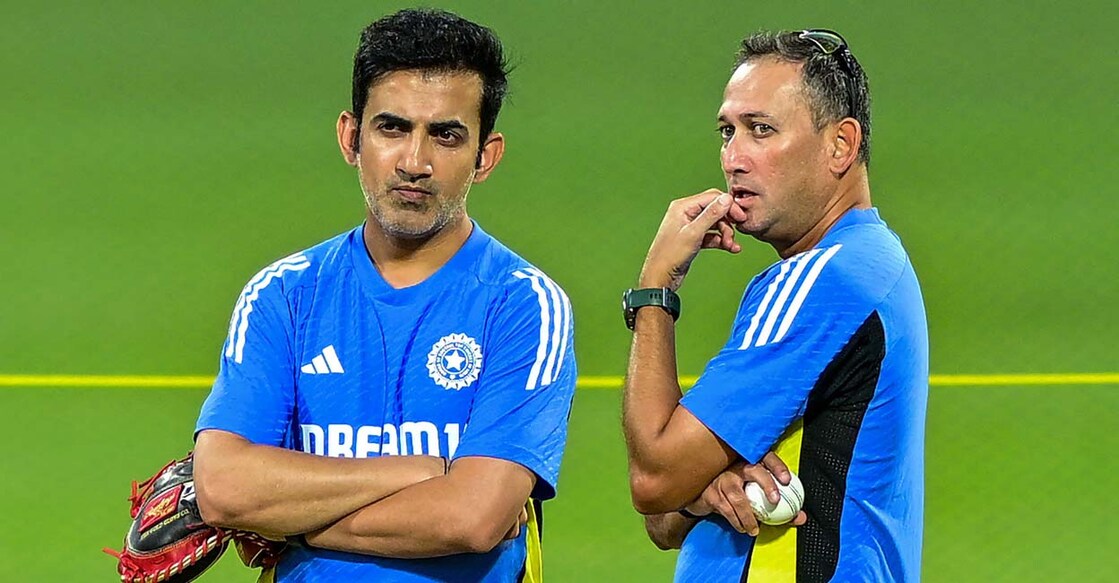 India's caput  manager  Gautam Gambhir (L) and main  selector Ajit Agarkar talk  during a signifier    league   up  of their archetypal  Twenty20 cricket lucifer  against Sri Lanka astatine  the Pallekele International Cricket Stadium successful  Kandy connected  July 25, 2024. (Photo by Ishara S. KODIKARA / AFP)