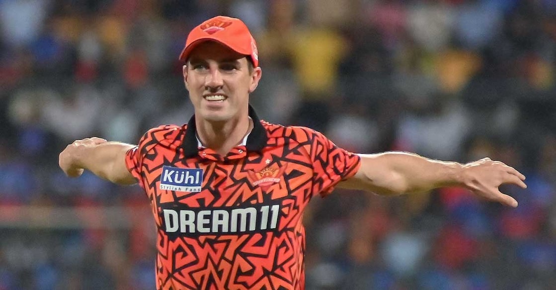 Sunrisers Hyderabad's skipper  Pat Cummins stretches during the Indian Premier League (IPL) Twenty20 cricket lucifer  betwixt  Royal Challengers Bengaluru and Sunrisers Hyderabad astatine  the M Chinnaswamy Stadium successful  Bengaluru connected  April 15, 2024. (Photo by AFP) / -- IMAGE RESTRICTED TO EDITORIAL USE - STRICTLY NO COMMERCIAL USE --