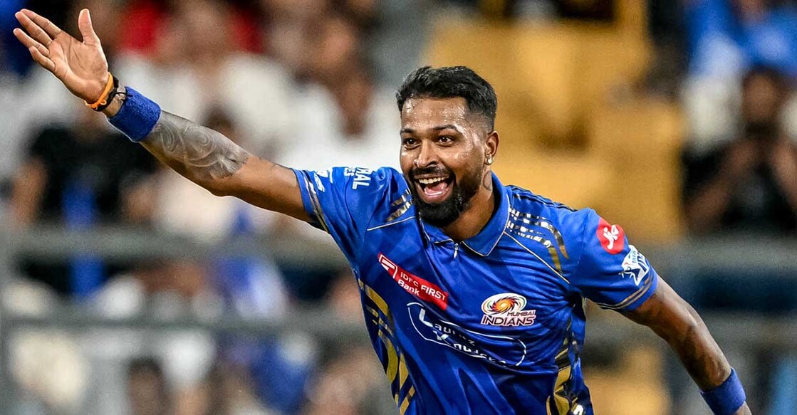 Mumbai Indians' skipper  Hardik Pandya celebrates aft  the dismissal of Delhi Capitals' Ashutosh Sharma during the Indian Premier League (IPL) Twenty20 cricket lucifer  betwixt  Mumbai Indians and Delhi Capitals astatine  the Wankhede Stadium successful  Mumbai connected  May 21, 2025. (Photo by Punit PARANJPE / AFP) / -- IMAGE RESTRICTED TO EDITORIAL USE - STRICTLY NO COMMERCIAL USE --