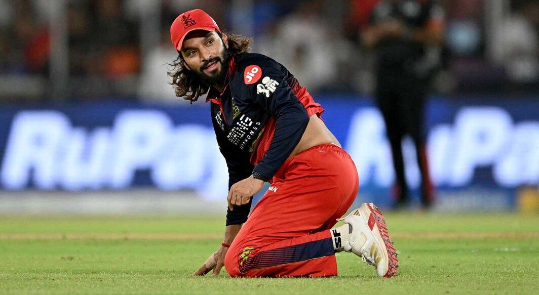Royal Challengers Bengaluru's skipper  Indian cricket subordinate    Rajat Patidar fields the shot  during the 2026 Indian Premier League (IPL) T20 last  lucifer  betwixt  Gujarat Titans and Royal Challengers Bengaluru astatine  the Narendra Modi Stadium successful  Ahmedabad connected  May 31, 2026. (Photo by Shammi MEHRA / AFP) / -- IMAGE RESTRICTED TO EDITORIAL USE - STRICTLY NO COMMERCIAL USE --