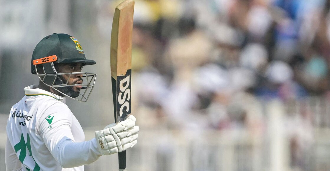 ഇന്ത്യയ്ക്കെതിരായ ഒന്നാം ടെസ്റ്റിന്റെ രണ്ടാം ഇന്നിങ്സിൽ അർധസെഞ്ചറി നേടിയ ദക്ഷിണാഫ്രിക്കൻ ക്യാപ്റ്റൻ ടെംബ ബാവൂമ.  (Photo by DIBYANGSHU SARKAR / AFP)
