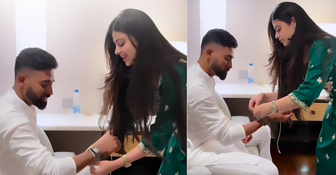 മുഹമ്മദ് സിറാജിന്റെ കയ്യിൽ രാഖി കെട്ടുന്ന സനായ് ഭോസ്‍ലെ (സനായ് ഇൻസ്റ്റഗ്രാമിൽ പങ്കുവച്ച വിഡിയോയിൽനിന്ന്)