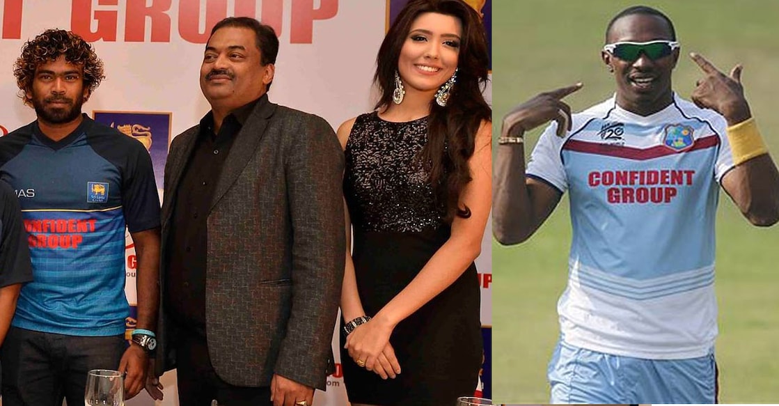 2016 ട്വന്റി20 ലോകകപ്പിൽ ശ്രീലങ്കൻ ടീമിനെ സ്പോൺസർ ചെയ്തുകൊണ്ടുള്ള പ്രഖ്യാപനത്തിൽ ലങ്കൻ താരം ലസിത് മല്ലിംഗയ്ക്കൊപ്പം സി.ജെ.റോയ് (Facebook/srilankacrick),  വെസ്റ്റിൻഡീസ് താരം ഡ്വെയ്ൻ ബ്രാവോ കോൺഫിഡന്റ് ഗ്രൂപ്പ് സ്പോൺസർ ചെയ്ത ടീം ജഴ്‌സിയിൽ (ഫയൽ ചിത്രം)