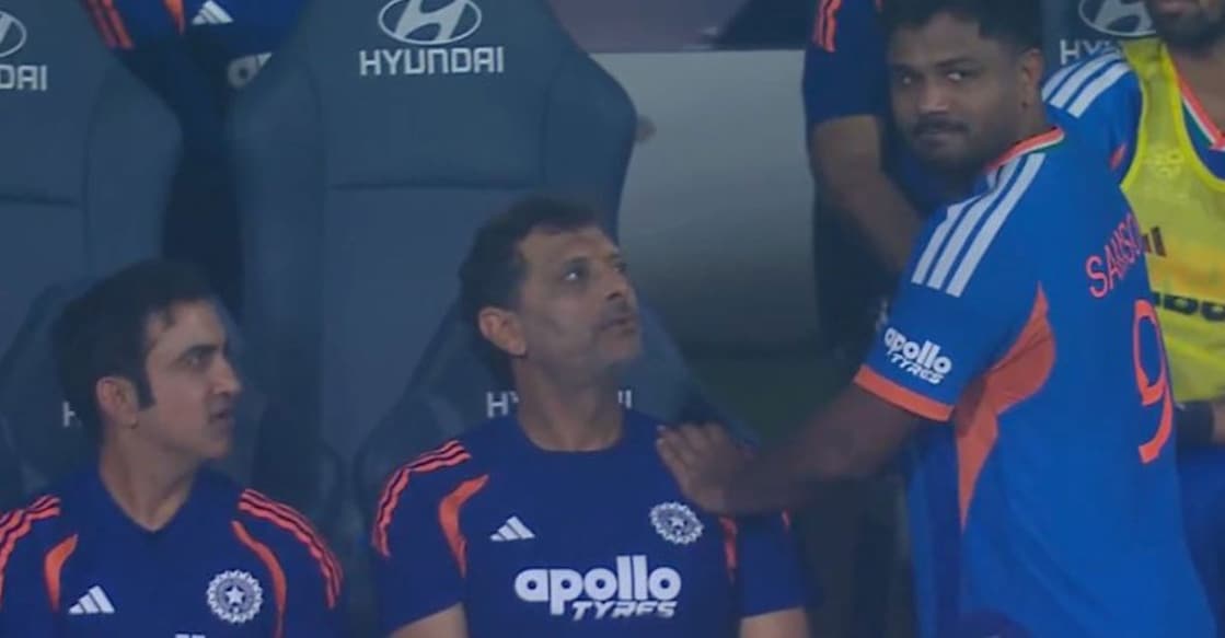 ട്വന്റി20 ലോകകപ്പിൽ സിംബാബ്‌വെയ്‌ക്കെതിരായ മത്സരത്തിൽ പുറത്തായശേഷം ഡഗൗട്ടിൽ തിരിച്ചെത്തിയ ഇന്ത്യൻ താരം സഞ്ജു സാംസണോട് സംസാരിക്കുന്ന മുഖ്യ പരിശീലകൻ ഗൗതം ഗംഭീറും  ബാറ്റിങ് പരിശീലകൻ സിതാൻഷു കോട്ടക്കും. X/@OneCricketApp