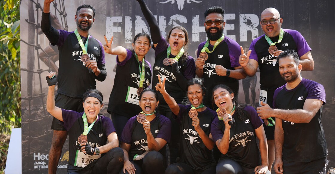 ഫാം റണ്ണിലെ വിജയികൾ മെഡലുമായി