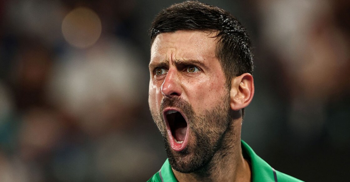 ഓസ്ട്രേലിയൻ ഓപ്പൺ ടെന്നിസ് പുരുഷ സിംഗിൾസ് സെമിഫൈനലിൽ യാനിക് സിന്നറിനെ തോൽപിച്ച   നൊവാക് ജോക്കോവിച്ചിന്റെ ആഹ്ലാദം.  (Photo by IZHAR KHAN / AFP)