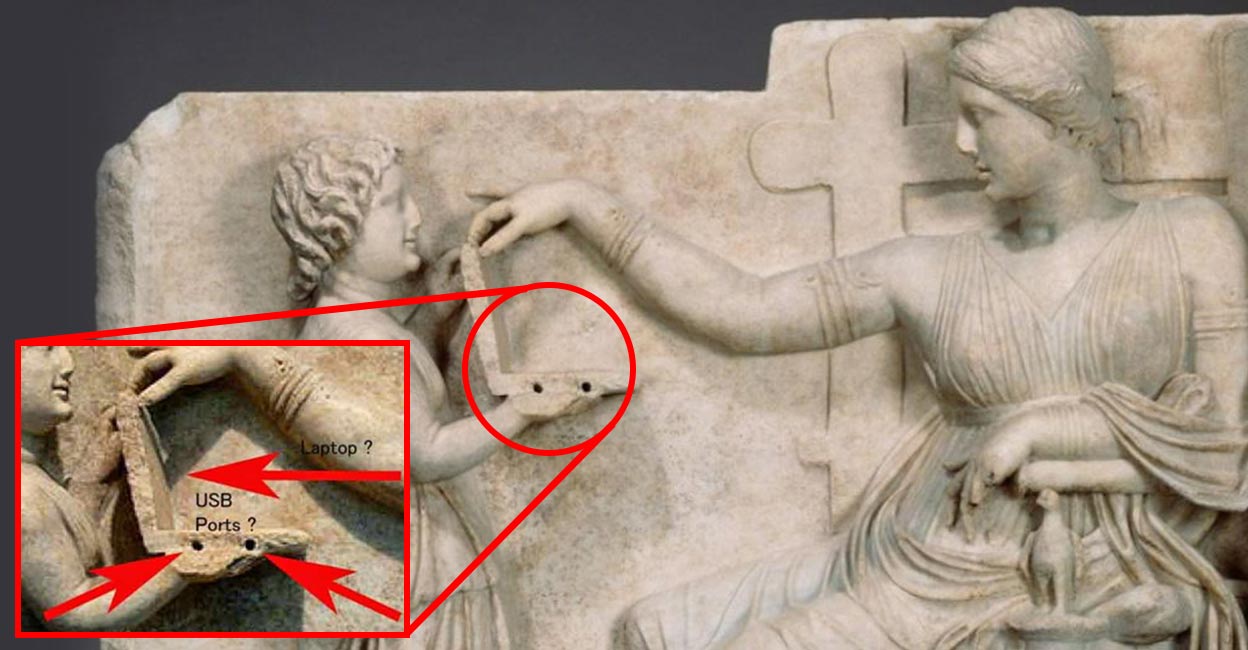ബിസി 100ലെ പ്രതിമയുടെ കയ്യിൽ ആധുനിക ലാപ്‌ടോപ്പ് Ancient Greek statue
