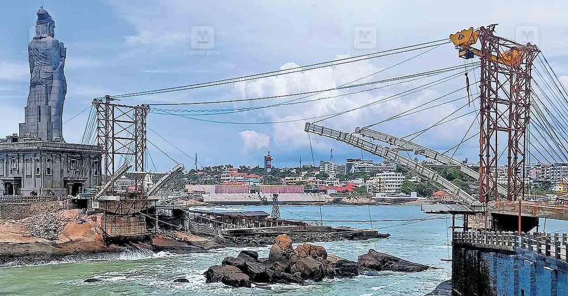 vivekanda-rock കന്യാകുമാരിയിൽ വിവേകാനന്ദപ്പാറയെയും തിരുവള്ളുവർ പ്രതിമയെയും ബന്ധിപ്പിച്ചു നിർമാണം പുരോഗമിക്കുന്ന കണ്ണാടിപ്പാലം
ചിത്രം: മനോരമ