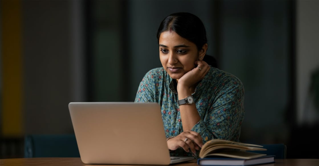 woman-with-latop-ai-generated-image Representative Image. Photo Credit : Image Generated Using AI