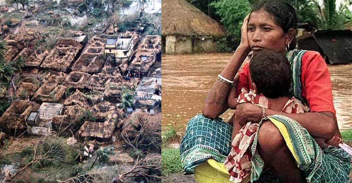 supercyclone-odisha ഒഡീഷയിലെ ചുഴലിക്കാറ്റിൽ തകർന്ന വീടുകൾ, കനത്ത മഴയിൽ വെള്ളംകയറിയ വീടിനുമുന്നിൽ യുവതിയും കുഞ്ഞും (Photo:X/ @chennai13621472, @iTannu)