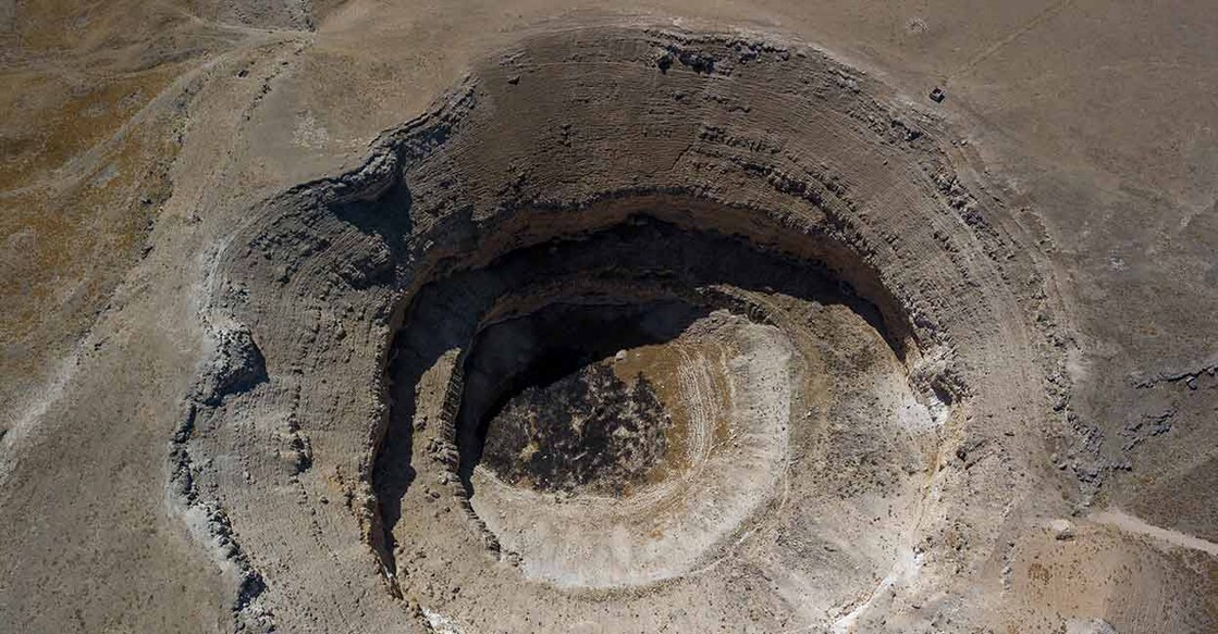 A Sinkhole Swallowed A Man's Bedroom In 2013. No Trace Of Him Has Been Found പ്രതീകാത്മക ചിത്രം. Image Credit:uchar /Istock