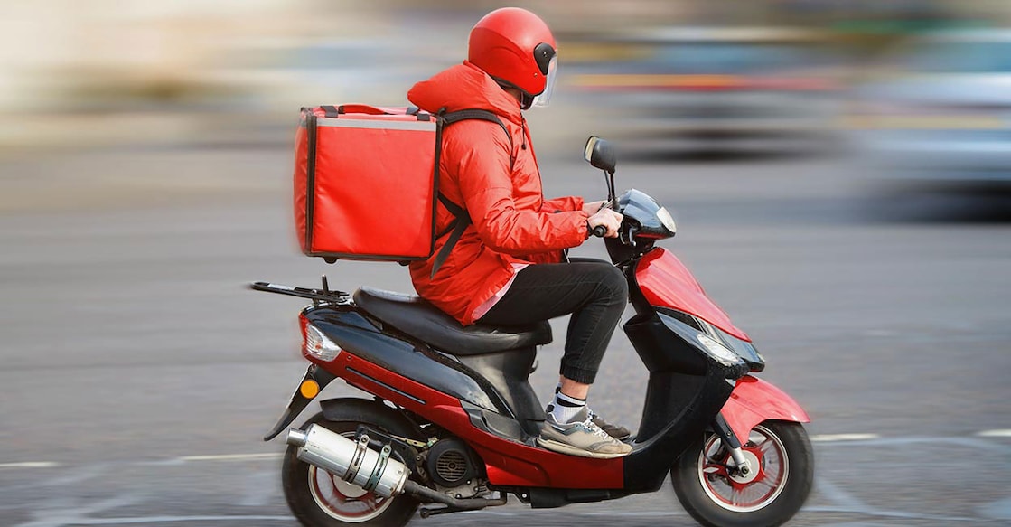food-delivery-boy Image Credits: Tricky_Shark/Shutterstock.com