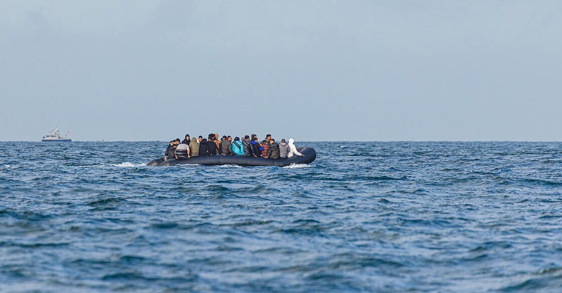 migrants-boat Photo Credit: Framalicious/shutterstock.com