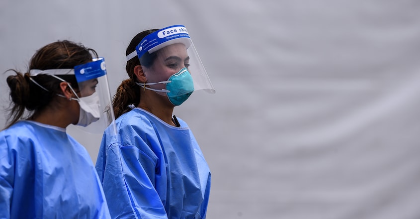 Medical staff wear PPE kit usa coronavirus Medical staff wear PPE kit usa coronavirus