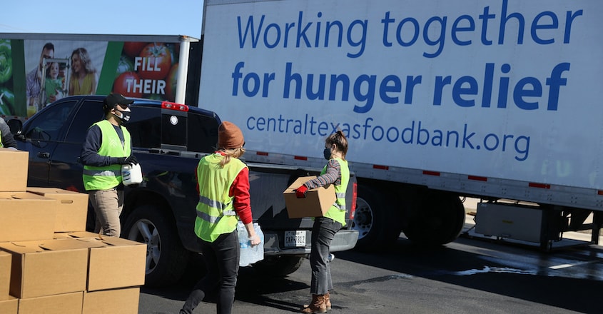 Volunteers with the Central Texas Food Bank. Photo by JOE RAEDLE / GETTY IMAGES NORTH AMERICA / AFP Volunteers with the Central Texas Food Bank. Photo by JOE RAEDLE / GETTY IMAGES NORTH AMERICA / AFP