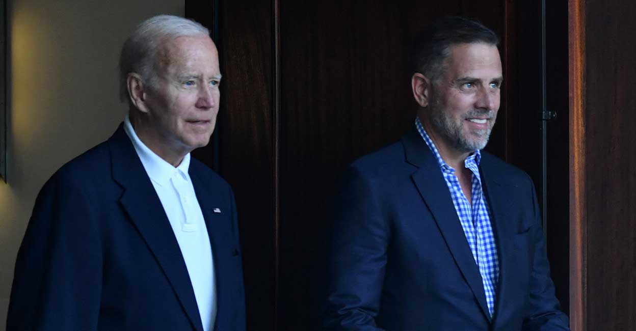 US President Joe Biden (L) and his son Hunter Biden. Photo by Nicholas Kamm / AFP