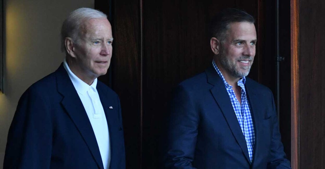 US President Joe Biden (L) and his son Hunter Biden. Photo by Nicholas Kamm / AFP