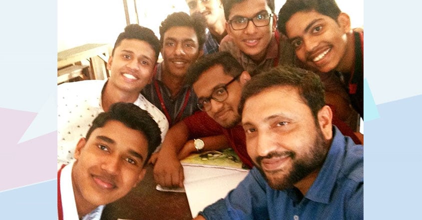 cyril-mathew-with-students cyril-mathew-with-students