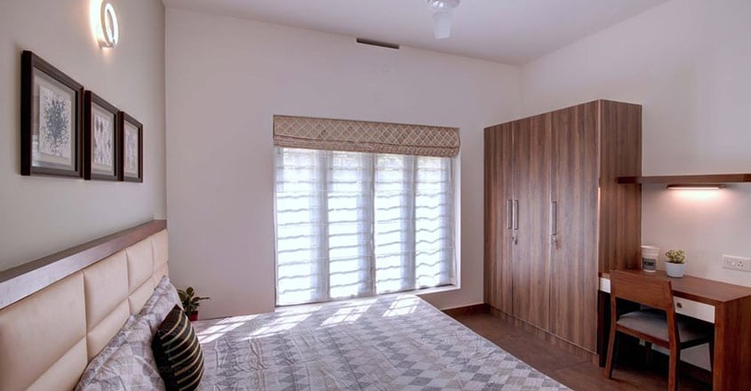 small-plot-house-changanacheri-bedroom small-plot-house-changanacheri-bedroom