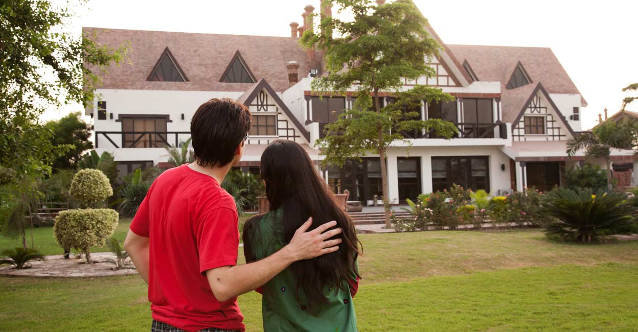 They build their house. New House settle. Family with Home back. A boy looking at a building. Build Family.