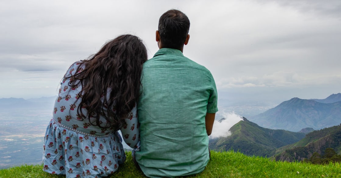 explorewithinfo-shuttershock-couple-sitting Representative image. Photo Credit: explorewithinfo/Shutterstock.com