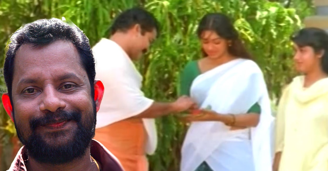 ഗിരീഷ് പുത്തഞ്ചേരി,  ‘കൈക്കുടന്ന നിറയെ തിരുമധുരം തരും...’ ഗാനരംഗത്തിൽ നിന്ന്. 