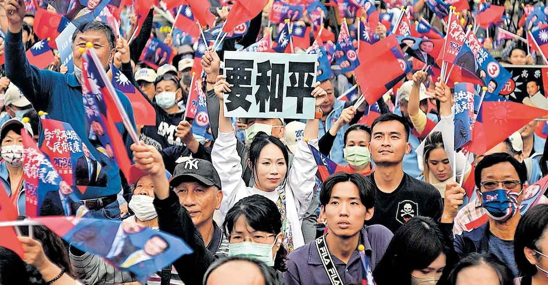 TAIWAN-POLITICS-VOTE
കുമിന്താങ്ങുകളുടെ പ്രസിഡന്റ് സ്ഥാനാർഥി ഹു യു ഇഹിനു വേണ്ടി തയ്വാനിലെ കവോസിയുങ്ങിൽ നടന്ന പ്രകടനം. ചിത്രം:എഎഫ്പി