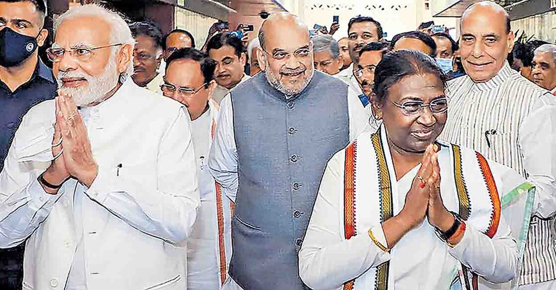PTI06_24_2022_000156B EDS: IMAGE POSTE BY @AmitShah**New Delhi: NDA's candidate Droupadi Murmu, accompanied by Prime Minister Narendra Modi, Union Ministers Rajnath Singh, Amit Shah, BJP President J P Nadda and other dignitaries, walks towards Parliament House to file her nomination papers for presidential election, in New Delhi, Friday, June 24, 2022. (PTI Photo) (PTI06_24_2022_000156B)