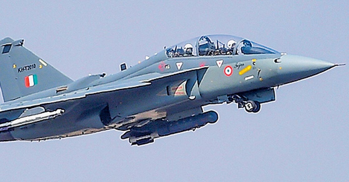 PTI02_04_2021_000111B Bengaluru: India Air Force's Tejas aircraft performs during the second day of the Aero India 2021 at Yelahanka air base in Bengaluru, Thursday, Feb. 4, 2021. (PTI Photo/Shailendra Bhojak) (PTI02_04_2021_000111B)
