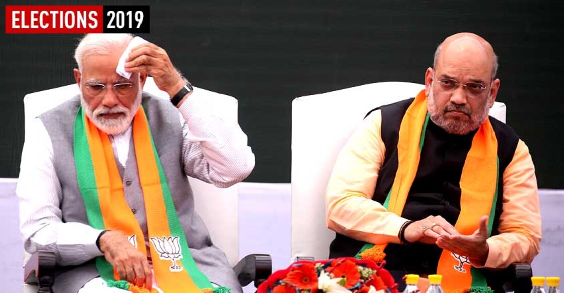 narendra-modi-amit-shah-1 നരേന്ദ്ര മോദിയും അമിത് ഷായും ബിജെപി പ്രകടനപത്രിക പുറത്തിറക്കുന്ന വേദിയിൽ.