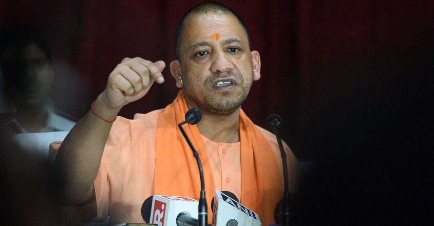 Yogi Adityanath (Photo by SANJAY KANOJIA / AFP) Yogi Adityanath (Photo by SANJAY KANOJIA / AFP)