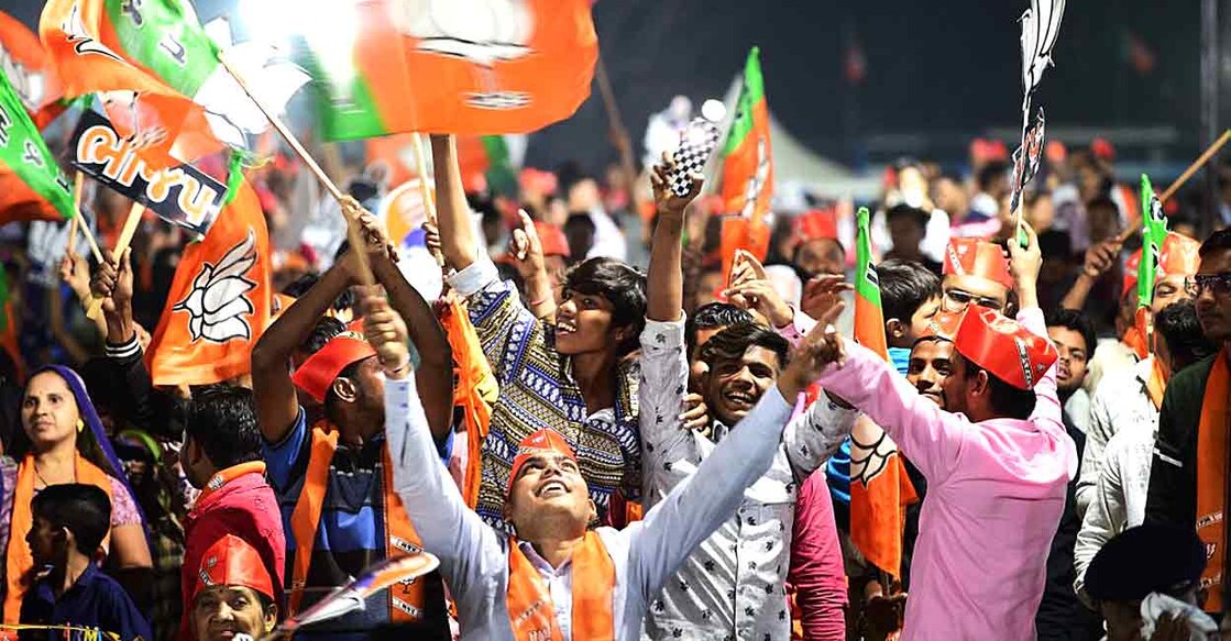 Gujarat Election 2022 BJP Photo by SAM PANTHAKY / AFP ഗുജറാത്തിലെ ബിജെപി പ്രവർത്തകരുടെ ആഘോഷം. Photo by SAM PANTHAKY / AFP