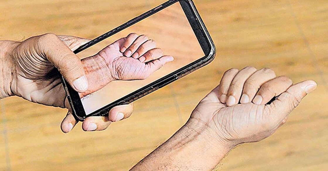 hand-and-phone hand-and-phone