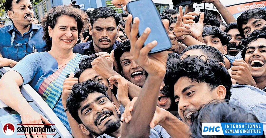 priyanka-gandhi-election-capaign തിരഞ്ഞെടുപ്പ് പ്രചാരണത്തിനിടെ വയനാട് മുട്ടിൽ ഡബ്ല്യുഎംഒ ആർട്സ് ആൻഡ് സയൻസ് കോളജിൽ എത്തിയ യുഡിഎഫ് സ്ഥാനാർഥി പ്രിയങ്ക ഗാന്ധിക്കൊപ്പം സെൽഫി എടുക്കുന്ന വിദ്യാർഥികൾ. ചിത്രം: സജീഷ് ശങ്കർ / മനോരമ