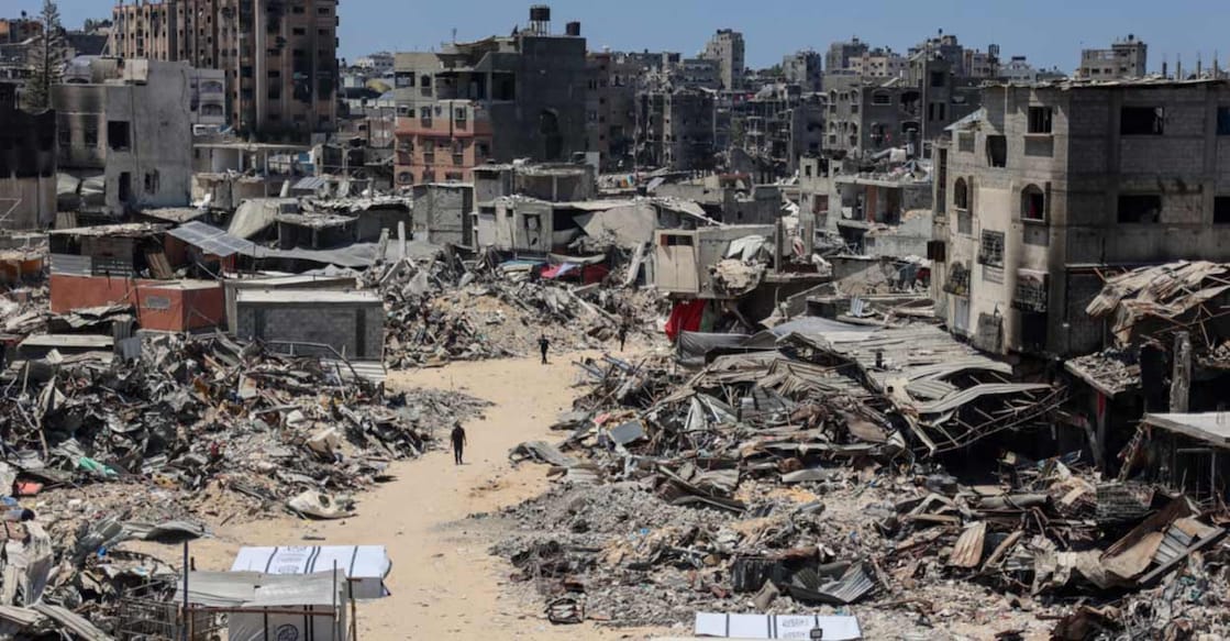 israel-attack-gaza-buildings വടക്കൻ ഗാസയിൽ ഇസ്രായേൽ ബോംബാക്രമണത്തിൽ തകർന്ന കെട്ടിടങ്ങൾ. (Photo by Omar AL-QATTAA / AFP)